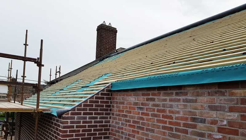 Roof battens fixed over membrane on a brick new build