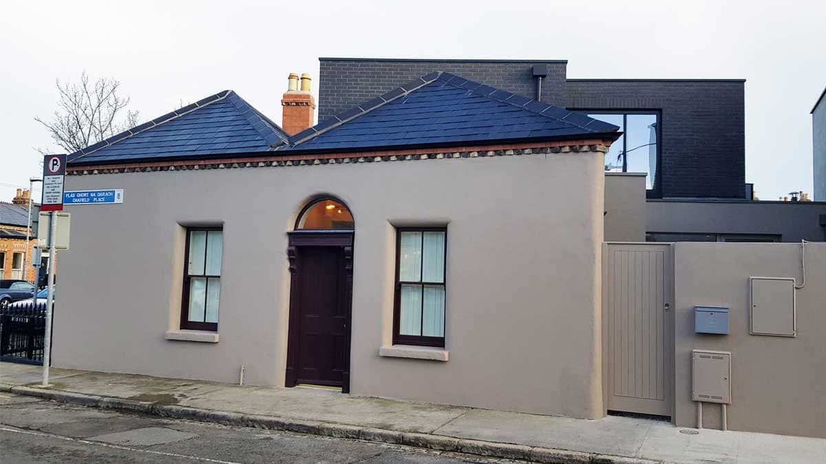 Refurbished period cottage with a slate hipped roof