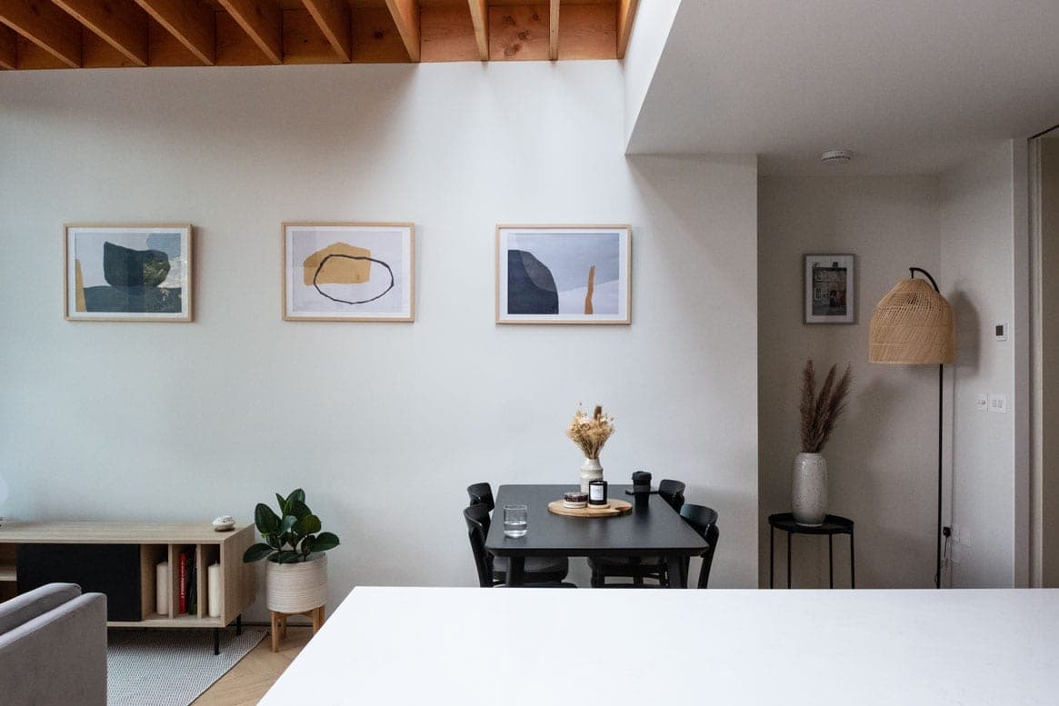 Dining area beneath exposed timber joists