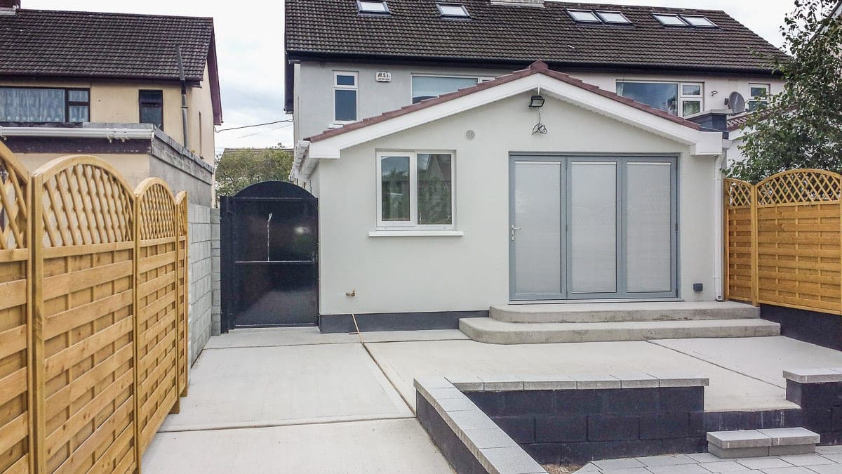 Single-storey rear extension with a new patio and fencing