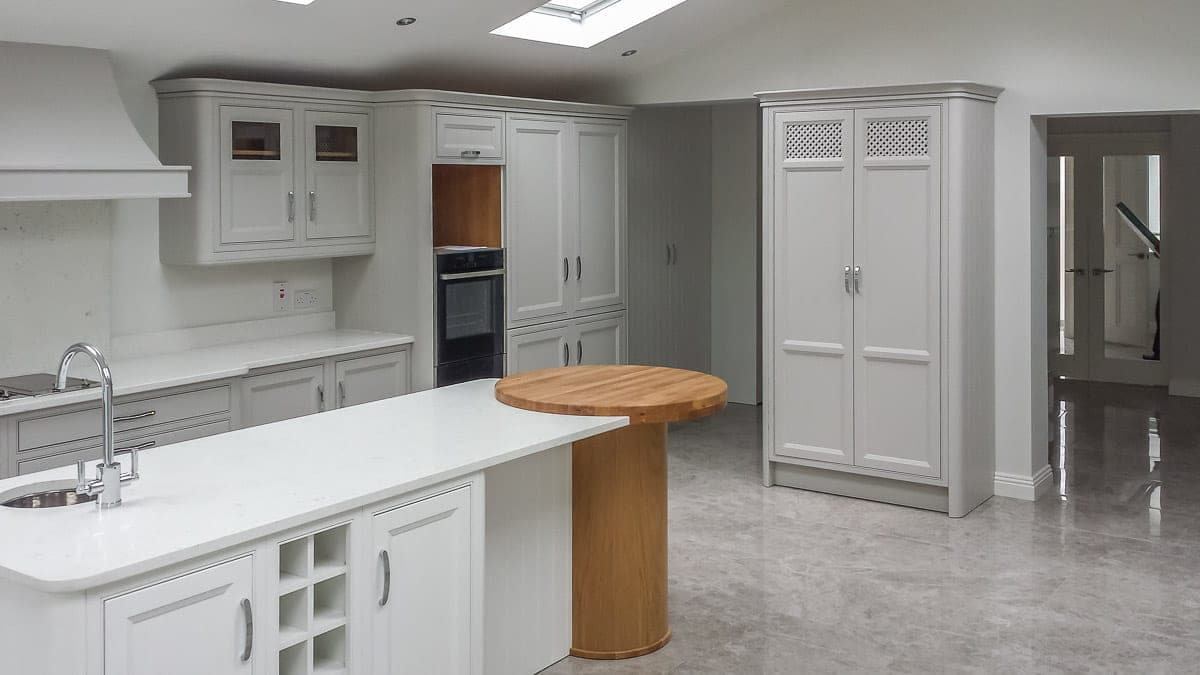 Painted Shaker kitchen with a full-height larder unit